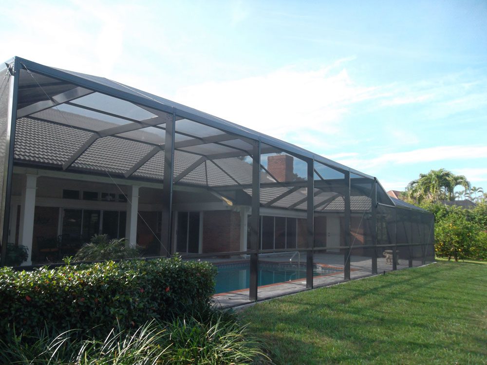 Pool enclosure and lanai screen replacement after hurricane damage | Sun Control Aluminum & Remodeling