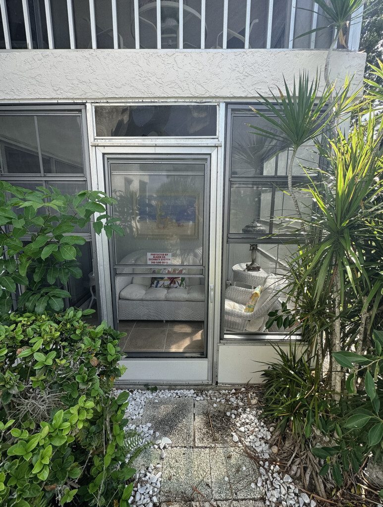 Before image of exterior of lanai enclosure | Sun Control Aluminum & Remodeling