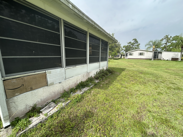 Before image of lanai window home improvement project | Sun Control Aluminum & Remodeling
