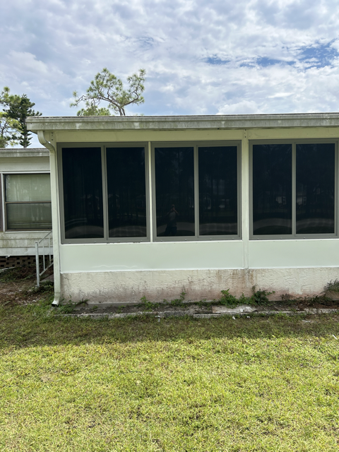 After image of impact resistant windows installed on a lanai | Southwest Florida - Sun Control Aluminum & Remodeling