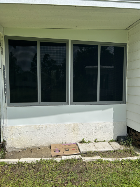 After image of newly installed impact windows on a lanai| Southwest Florida - Sun Control Aluminum & Remodeling